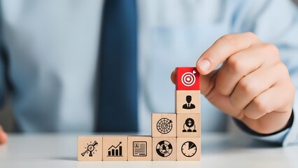 Building a business strategy with wooden blocks