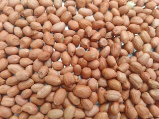 Close up shot of pile of fresh peanut seed.