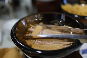 Korean barbecue grill dinner, 4K. Tongs sliced food
