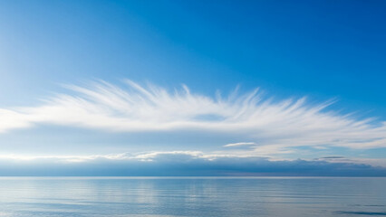 Calm ocean water and blue sky with clouds landscape background stock photo