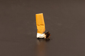 cigarette butts  on black background