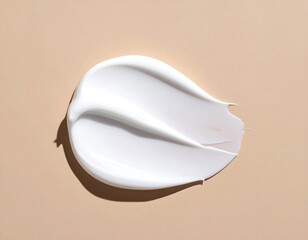 Minimalist white cream smear on beige background capturing texture and smoothness