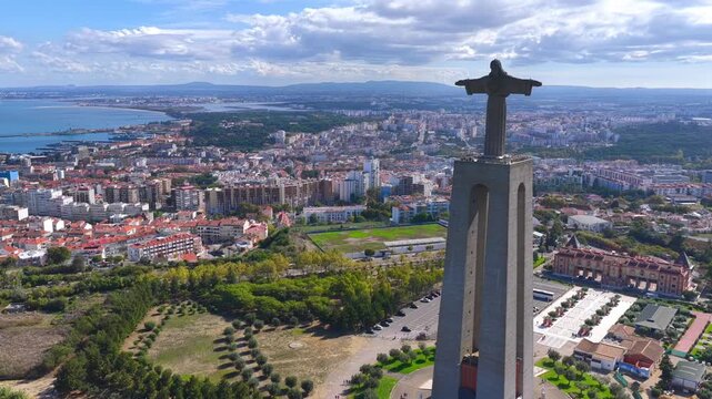 Wide Aerial Drone View of Cristo Rei Sanctuary Overlooking Lisbon Cityscape and the Tagus River in Portugal &ndash; Scenic Landscape, Urban Panorama and Iconic Monument from Above
