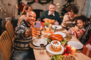 Joyful holiday gathering with friends sharing festive cookies, enjoying roast turkey, and sipping red wine in a warm atmosphere filled with laughter, desserts, and seasonal decorations
