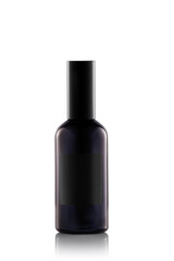 A dark glass bottle sits on a reflective surface. No labels or markings are visible. The focus is on the bottle's shape and color in a simple setting.