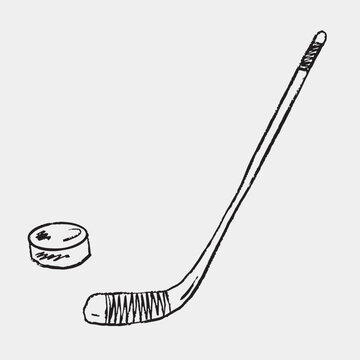 Hand drawn hockey stick and puck. Vector sketch illustration in vintage crayon charcoal style. Winter sports label, invitation design, equipment