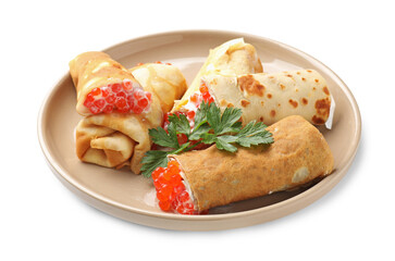 Tasty crepes with red caviar, sour cream and parsley isolated on white