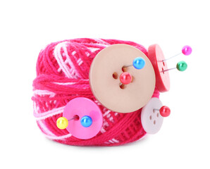 Ball of bright knitting yarn with buttons and pins isolated on white