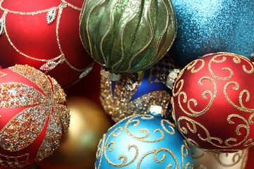 Many beautiful Christmas balls as background, top view