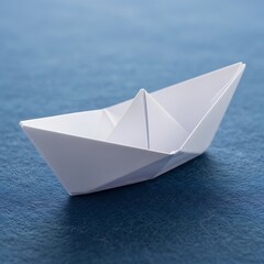 Obraz premium Simple white paper boat floating on blue sea, creative leisure time