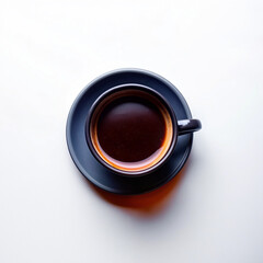 Hot black coffee on white surface