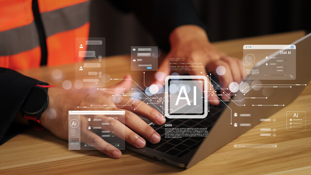 Industrial engineer using laptop with AI chatbot interface. Concept of artificial intelligence technology, smart construction, digital future automation, and machine learning system.