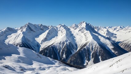 Sun-Kissed Alpine Majesty: A Grand Panorama of Snowy Peaks and Shadowed Valleys.