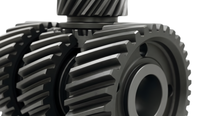 Close up of metal gears meshing together in a mechanical assembly isolated on a transparent background