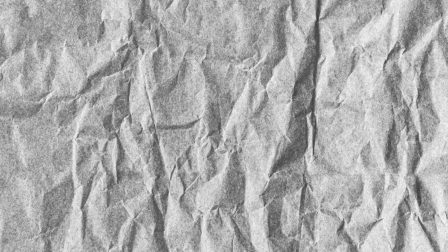 Crumpled paper texture background. White wrinkled sheet. Overlay effect image