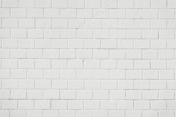 White painted brick wall with visible mortar lines and realistic texture, modern urban or industrial background in color of the year 2026 Cloud Dancer. Natural backdrop for design, mockups