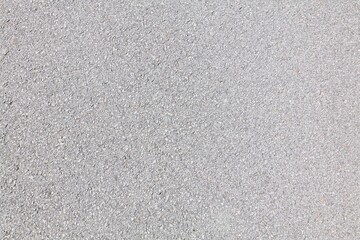 Road surface background. Asphalt bright grey blacktop road texture.