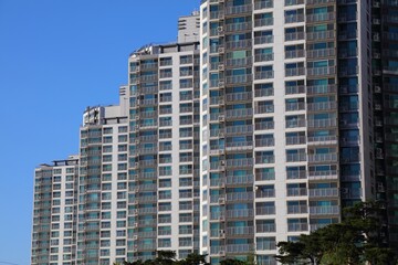 Seoul city view. Tall generic apartment buildings residential neighborhood in Jamsil district (Jamsil-dong). High density housing estate.