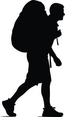 Silhouette hiker with backpack walking outdoors