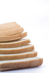 Sliced White Bread Stacked on White Background
