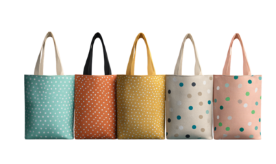 Colorful polka dot tote bags in a row on black on transparent background