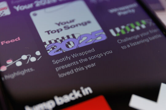 Spotify Wrapped 2025 Your Top Songs playlist interface on smartphone screen