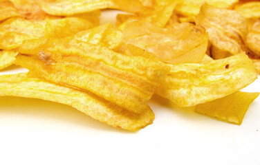 Banana chips on white background 