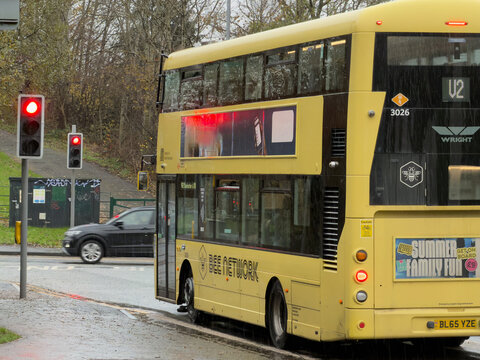 Yellow Bee Network bus owned Transport for Greater Manchester travelling along the Guided busway in Worsley Manchester. 