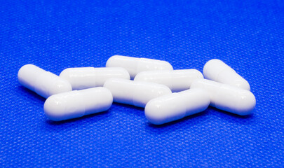 pills on blue background