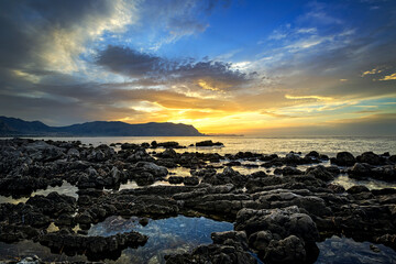 Dramatic sunset at Isola delle Femmine on the north coast of Sicily