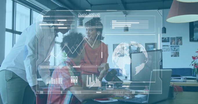 Working team in business casual leaning and reviewing laptop and tablet in office showing AR charts