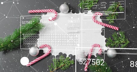Displaying scalloped doily with candy canes, evergreen sprigs, silver baubles, HUD overlay on table