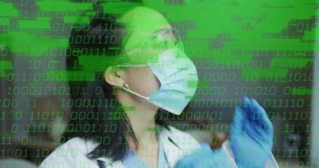 Raising gloved hand, Korean woman preparing in lab, wearing mask, goggles, lab coat, binary overlay