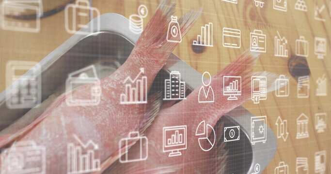 Displaying two red fish resting tail-up in stainless steel tray on wooden counter, icons overlay