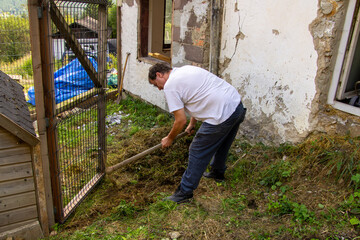Digging in the mountain with a pickaxe
