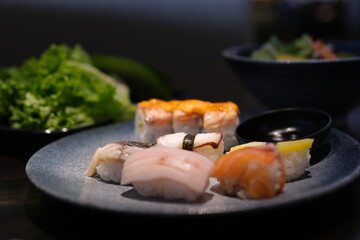 Flying sushi pieces are placed between chopsticks. Sushi and roll levitation with soy sause. . High quality 4k footage