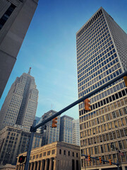Blue sky day over downtown Detroit skyscrapers 