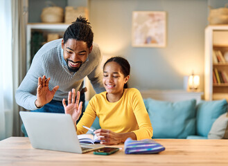 Father and daughter doing homework with laptop at home. Father and teenage girl happy using laptop. Teen girl and dad sitting at home working with notebook