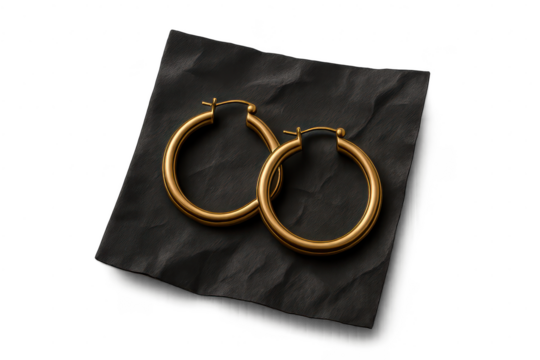 Elegant gold hoop earrings isolated on transparent background, jewelry item