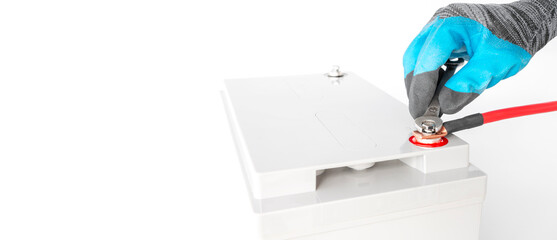 attaching positive terminal to battery connector, solar cells, battery backup power on isolated white, with copy space