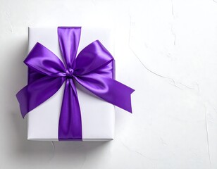 Elegant white gift box with luxurious purple satin ribbon on textured background