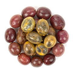 Obraz premium Top View of Whole Purple Passion Fruits with Fresh Juicy Arils Isolated on White
