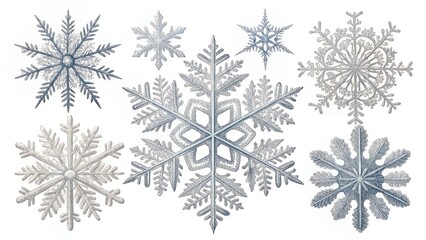 Collection of intricate and delicate snowflake designs for winter holidays.