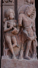 Obraz premium India, Uttar Pradesh, Lalitpur, Beautiful Carving Sculptures of Hindu Deities, Musicians and Doorkeeper on the Ancient Shree Dashavtara Lord Vishnu Temple of Deogarh. 