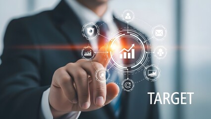 Businessman touching a digital target with business icons and futuristic interface technology