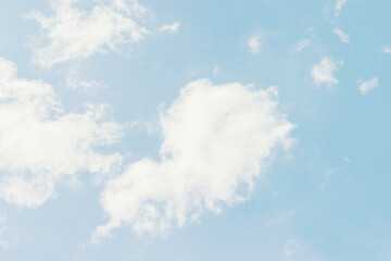 Beautiful blue sky with light white cloud background, dancer overcast. Demonstrating color, trend...