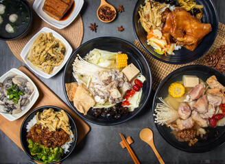 Savor authentic Asian flavors with a delectable spread of hot pot, chicken rice, oysters, and tofu, perfect for a vibrant and memorable meal.