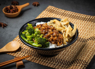 Taiwanese braised pork rice bowl with vibrant broccoli and bamboo shoots ready to be enjoyed for a delicious meal