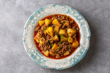 Traditional delicious Turkish food; meat potato dish . Turkish name; kiymali patates