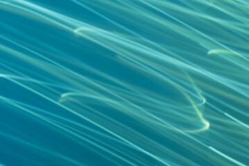 Abstract blue and green wavy line background pattern
